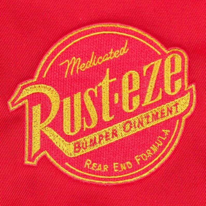 Rust-eze Logo - Rust Eze Logo From Disney's Cars Custom Embroidered Child's Red Apron Bib, For Baking & Crafts