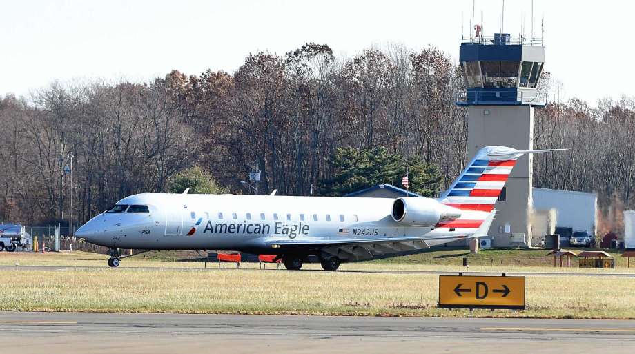 Airline with Gold Harp Logo - American to add regional jet service from Tweed to Charlotte