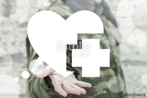 Military Medical Cross Logo - Soldier offers heart with medical cross icon on a virtual interface