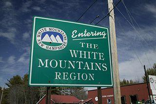 Red Square with White Mountain Logo - Red Jacket Mountain View Resort