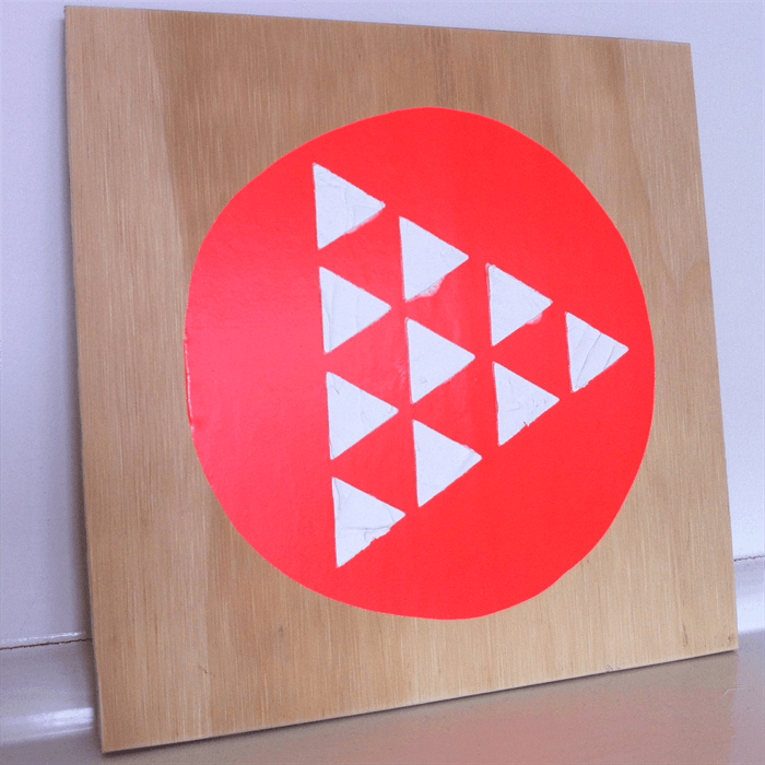 Orange Circle White Triangle Logo - hanging wall art.. fluro orange circle + white triangles