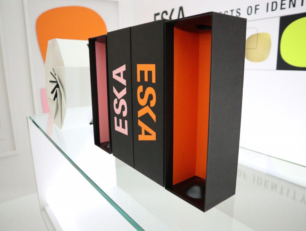 Red Orange White Logo - Eska Gallery, Solid coloured board in red, white, orange and pink.