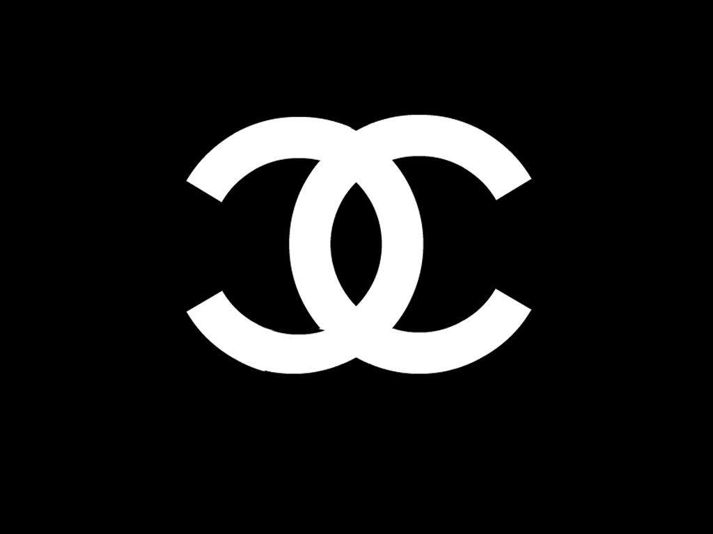 Chanel Black and White Logo - The Chanel logo, designed by Coco Chanel herself in 1925, It remains ...