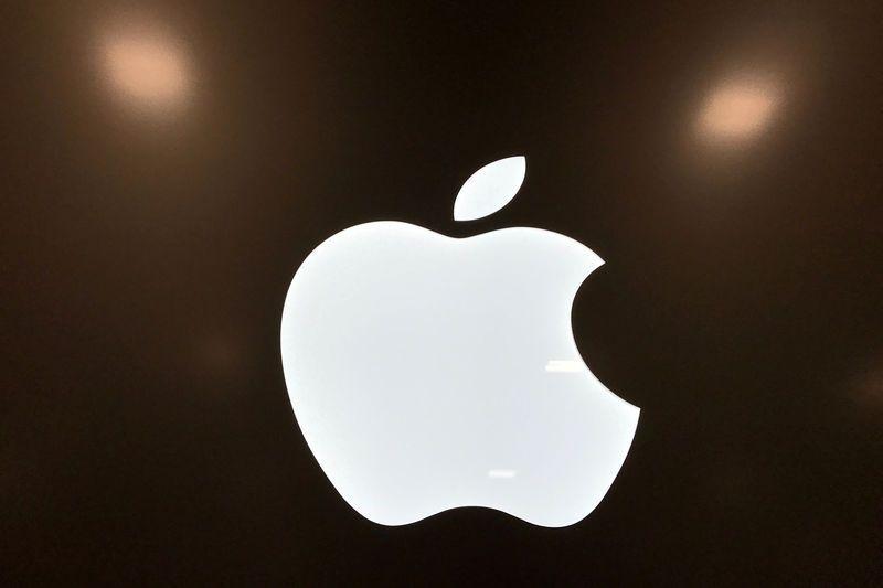 Black and Red Apple Logo - Berkshire trims Apple stake, adds Suncor and Red Hat, exits Oracle