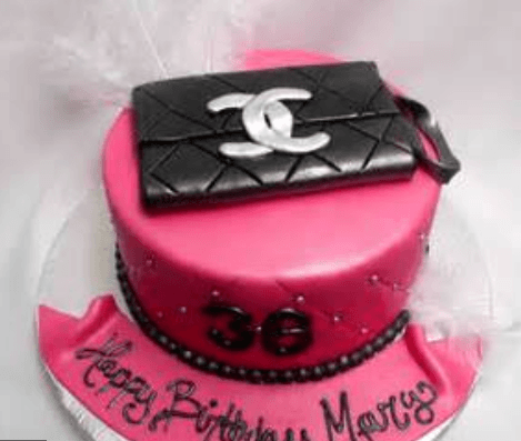 Hot Pink Chanel Logo - Newest designer handbags cake in hot pink with black Chanel clutch ...