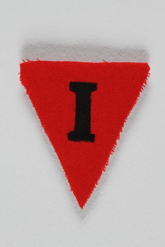 Red Triangle Shield Logo - Unused red triangle concentration camp prisoner patch with a black