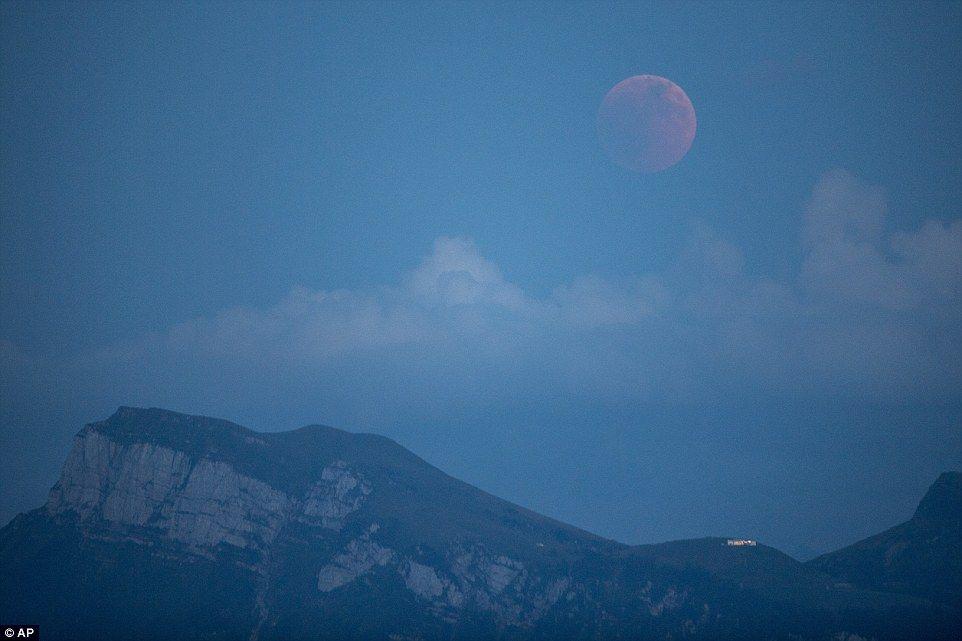 Red Moon Mountain Logo - Longest lunar eclipse in 100 years sees Blood Moon in the sky across