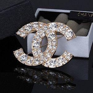 Diamond Chanel Logo - Chanel Logo Diamond Filigree Brooch - Celebrities who use a Chanel ...