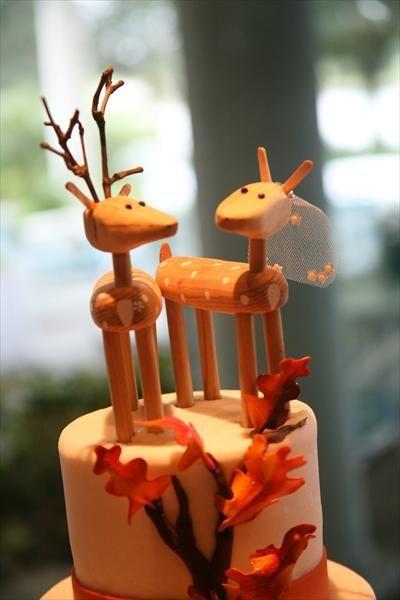 Tiny Orange Leaf Logo - An autumn themed wedding cake. .. hand carved wooden reindeer