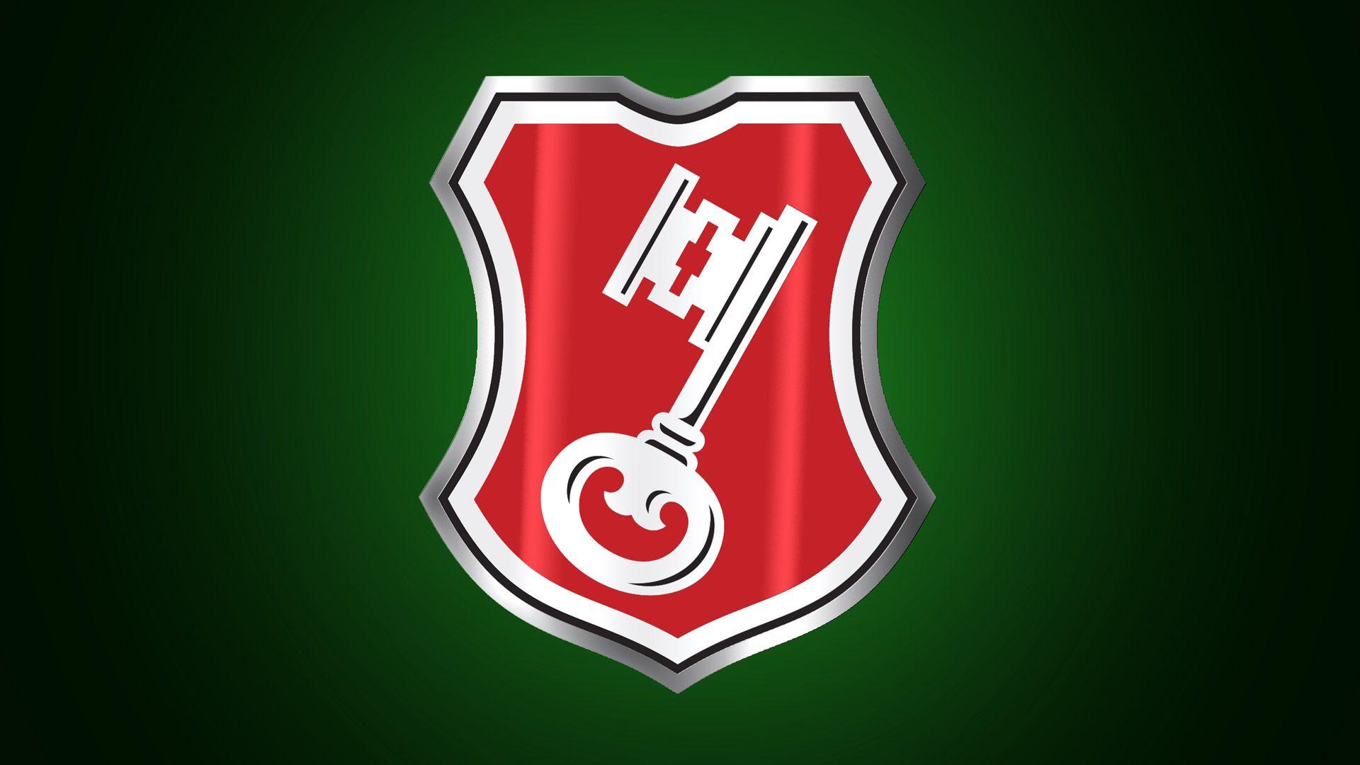 Green and Red Shield Logo - Becks