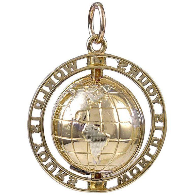 Gold World Globe Logo - Gold World Is Yours Globe Charm For Sale at 1stdibs