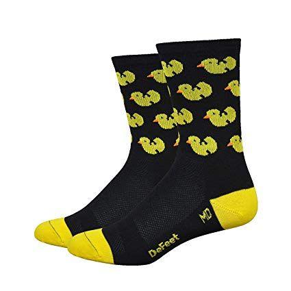 Looks Like a Black and Yellow D Logo - Amazon.com: DEFEET Aireator Tall D-Logo Hi-Top Socks: Sports & Outdoors