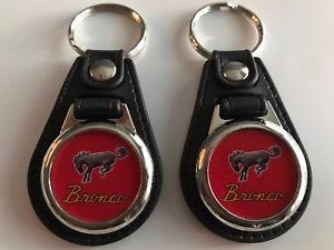 Red Bronco Logo - FORD BRONCO KEYCHAIN 2 PACK TRUCK LOGO RED WITH SILVER TRIM | eBay