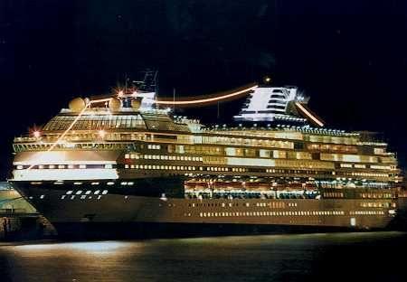 Ship Fog Logo - Cruise ship lit up at night. Similar to The Majesty The Fog