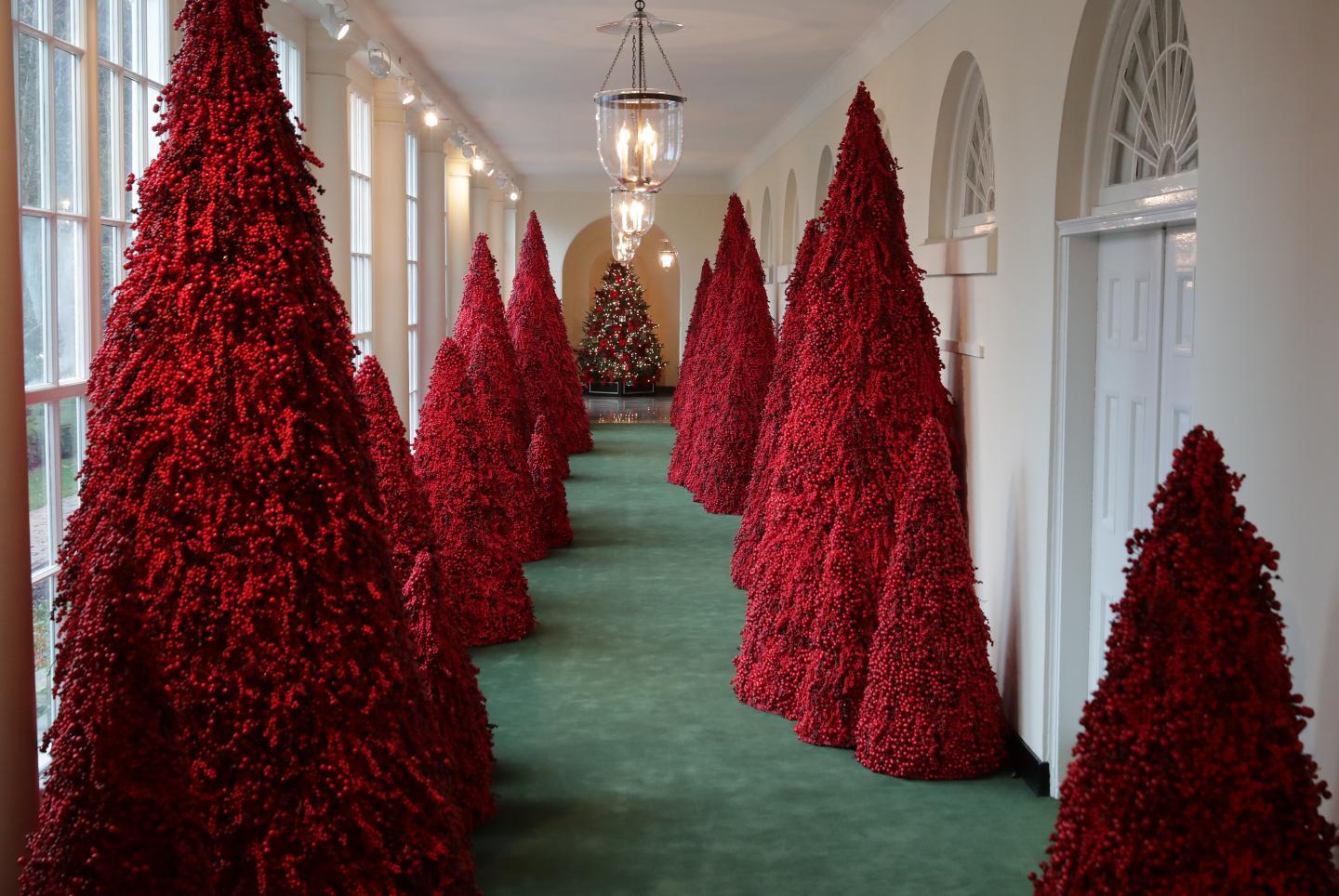 Christmas Tree and a Red S Logo - Criticism of Melania Trump's Red 'Handmaid's Tale' Christmas Trees ...