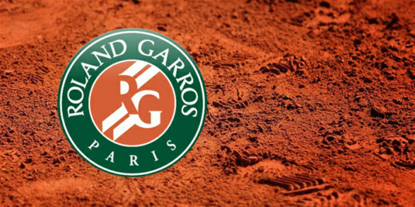 RG in Orange Circle Logo - The Isteciens at Roland Garros