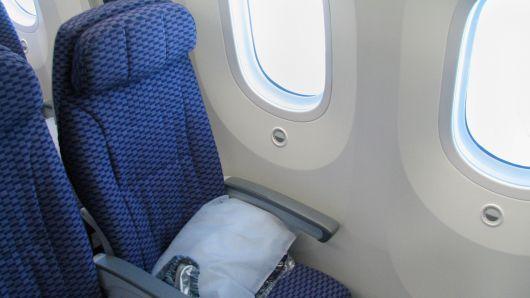 United Economy Seat Logo - Handling Flight Cancelations and Preferred Seat Fees