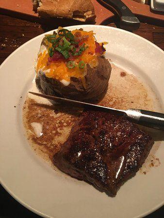 Steak N Bake Logo - Flat Iron skillet Steak and loaded bake potato of LongHorn