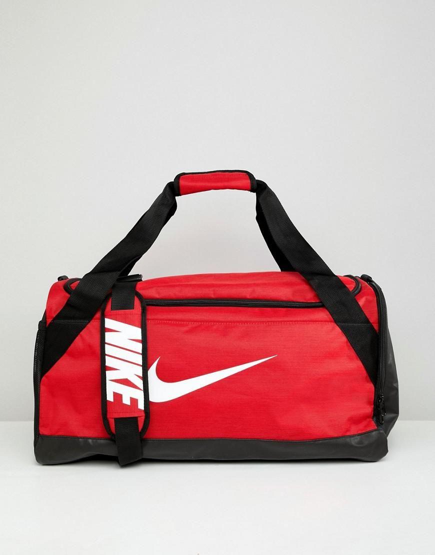 Black Red Swoosh Logo - Nike Red Swoosh Logo Duffle Bag in Red