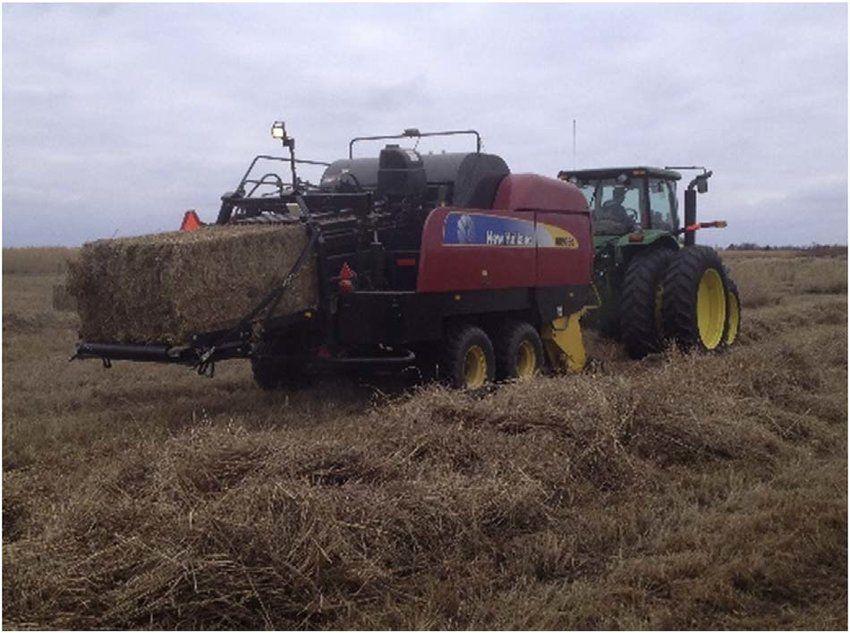 New Holland Baler Logo - New Holland BB9080 large square baler powered by a John Deere 7930 ...