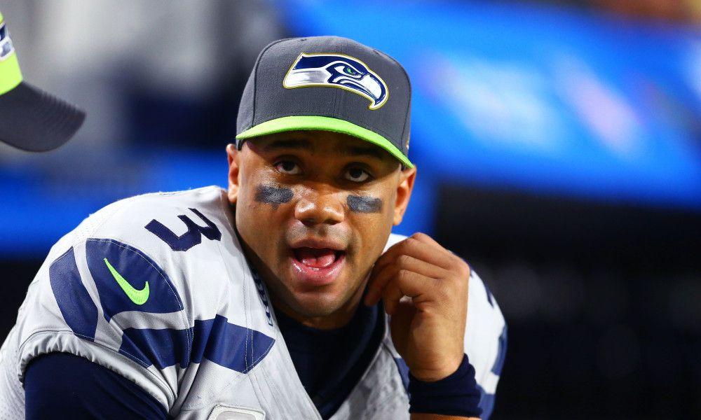 Wilson W Logo - Russell Wilson unveils new logo that looks just like every other ...