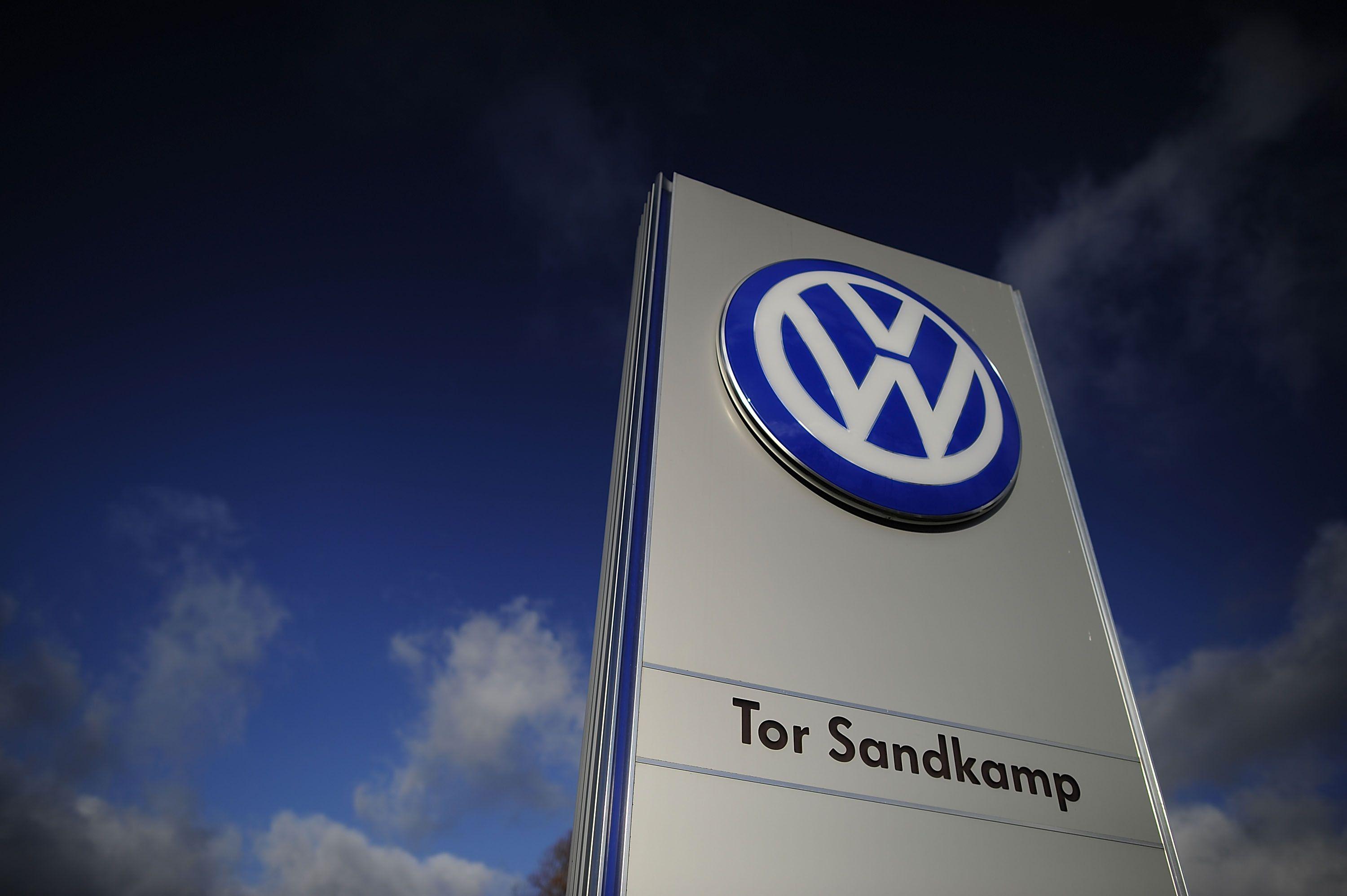 Wolfsburg VW Blue Logo - Volkswagen to Issue Fixes for Cars in Emissions Scandal | Time