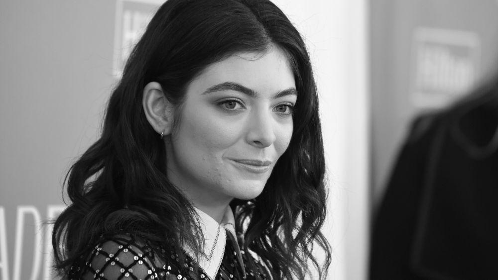 Lorde Black and White Logo - Lorde Supports #MeToo Movement With Quote Sewn Into Grammy Dress