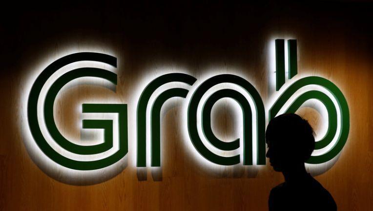Grab Singapore Logo - Uber rival Grab partners with driverless car firm in Singapore | Fox ...