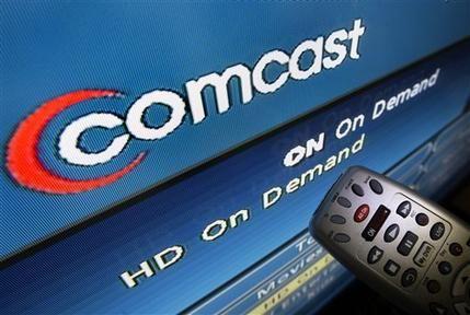 Universal a Comcast Company Logo - Comcast takes control of NBC Universal