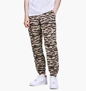 Camo Nike Swoosh Logo - Nike Sportswear Big Swoosh Woven Pant Green Khaki Camo AO0863 235