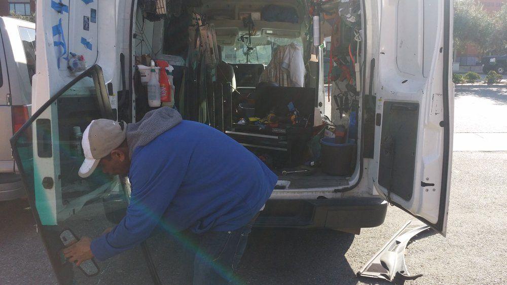 Hernandez Auto Service Logo - Removing all accessories from the old windshield - Yelp