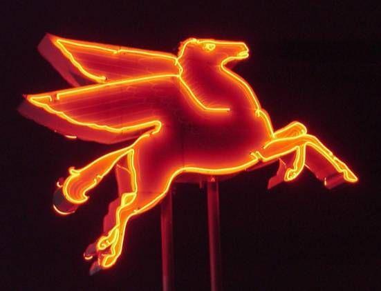 Red-winged Horse Logo - Brightly lit by neon, the red-winged horse appears to gallop over ...