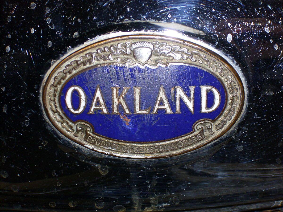 Antique All American Car Company Logo - Oakland Motor Car Company