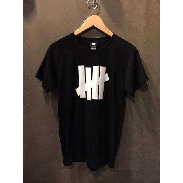 Undefeated Black Logo - Brand New Undefeated Black Logo Tee T-Shirt , Men's Fashion on Carousell