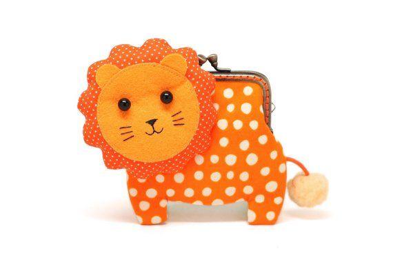 Little Orange Lion Logo - Little orange lion clutch purse in bubbly dotty print