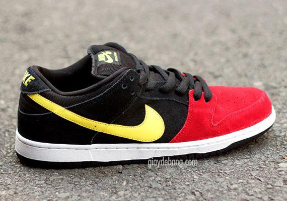 Red and Yellow Nike Logo - Nike SB Dunk Low