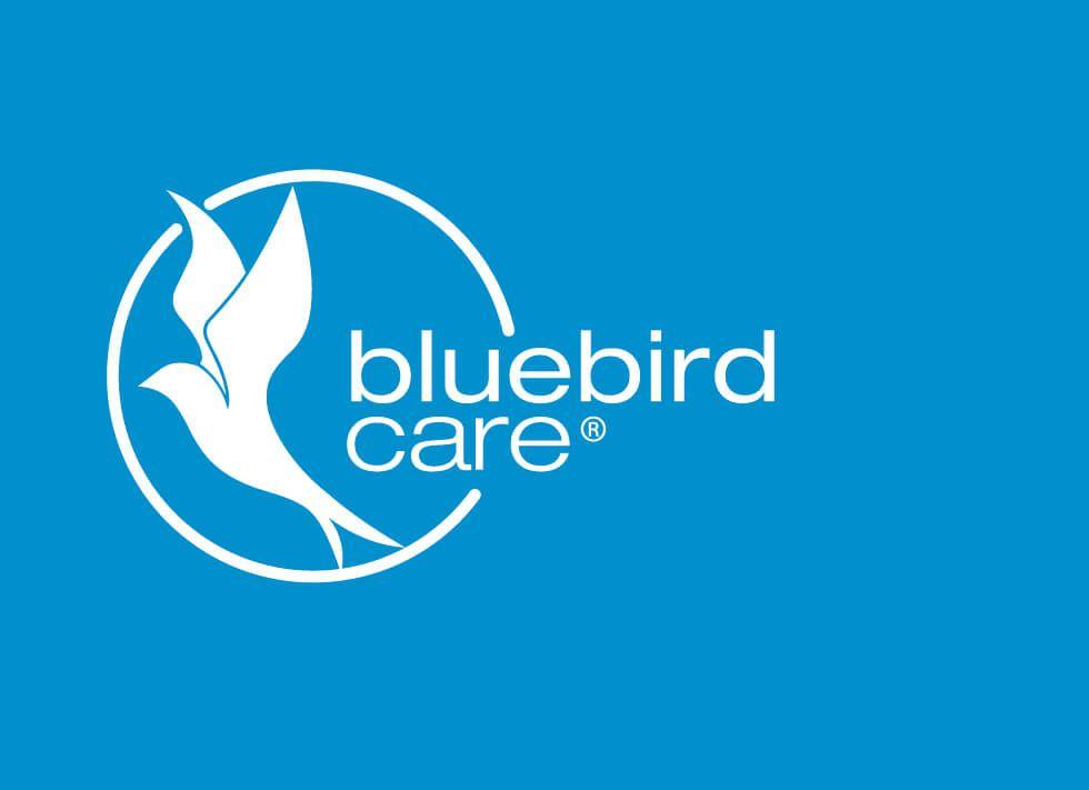 White with Blue Bird Logo - Bluebird Care