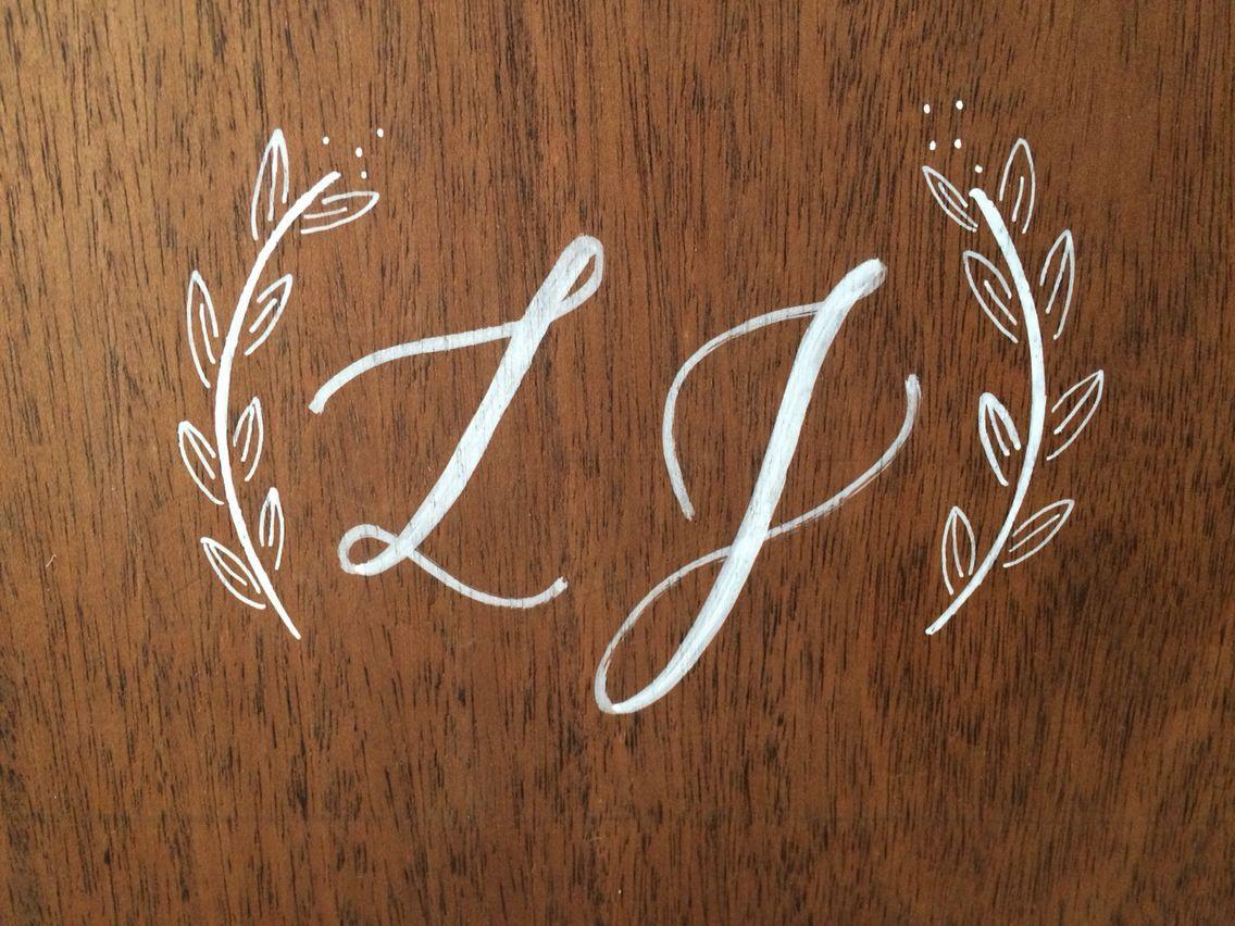 Rustic Wedding L Logo - L+J wedding monogram on wood. With pretty little laurels ...