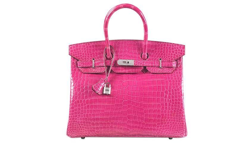 Crocodile with Pink Logo - PETA buys stake in Hermès in dispute over crococile skins