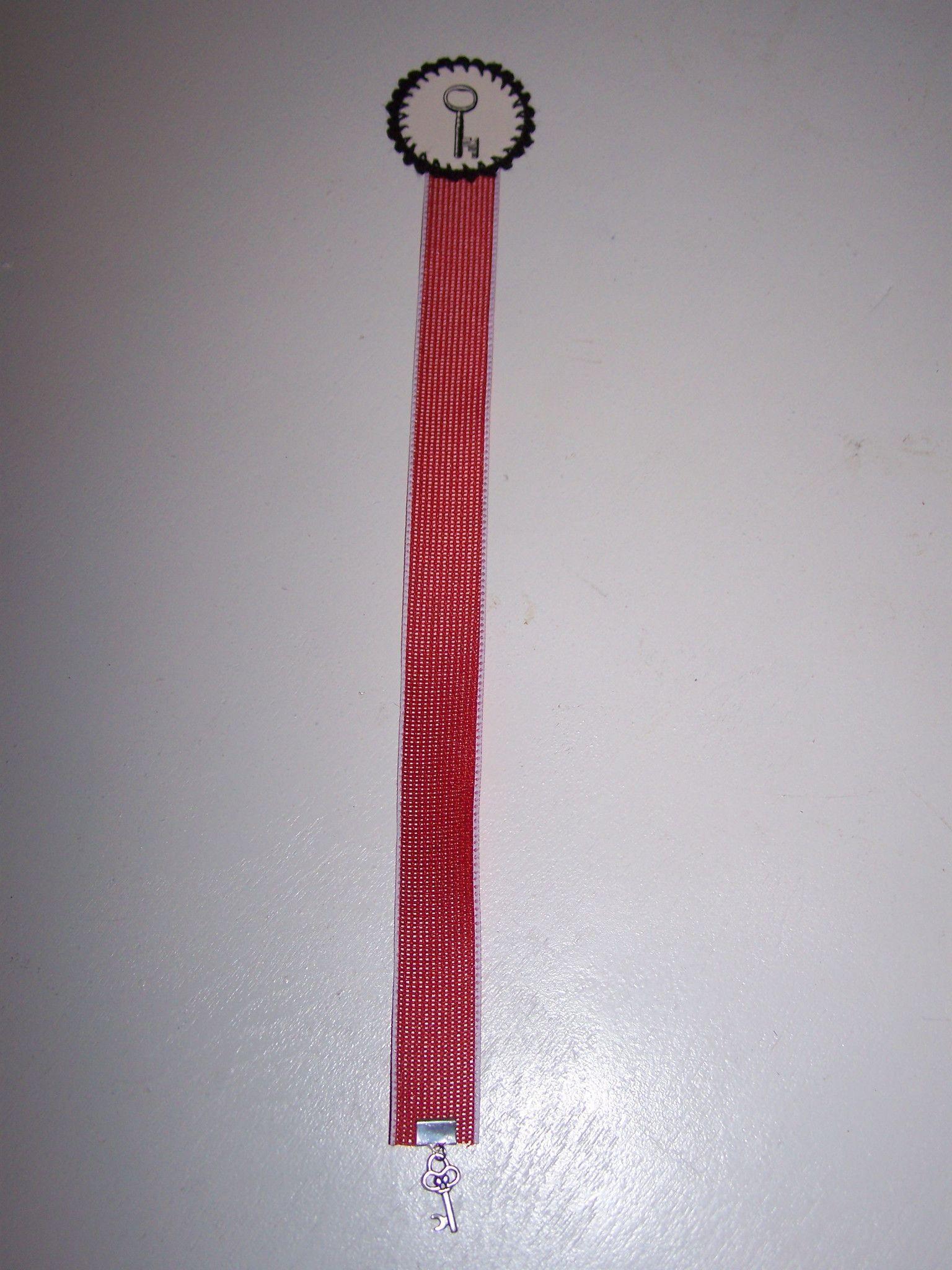 Red Ribbon Bookmark Logo - Black Key Red Ribbon Bookmark. Books & Accessories