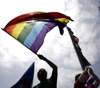 Person Holding Rainbow Logo - LGBTQ Student Groups at U-M | Student Life