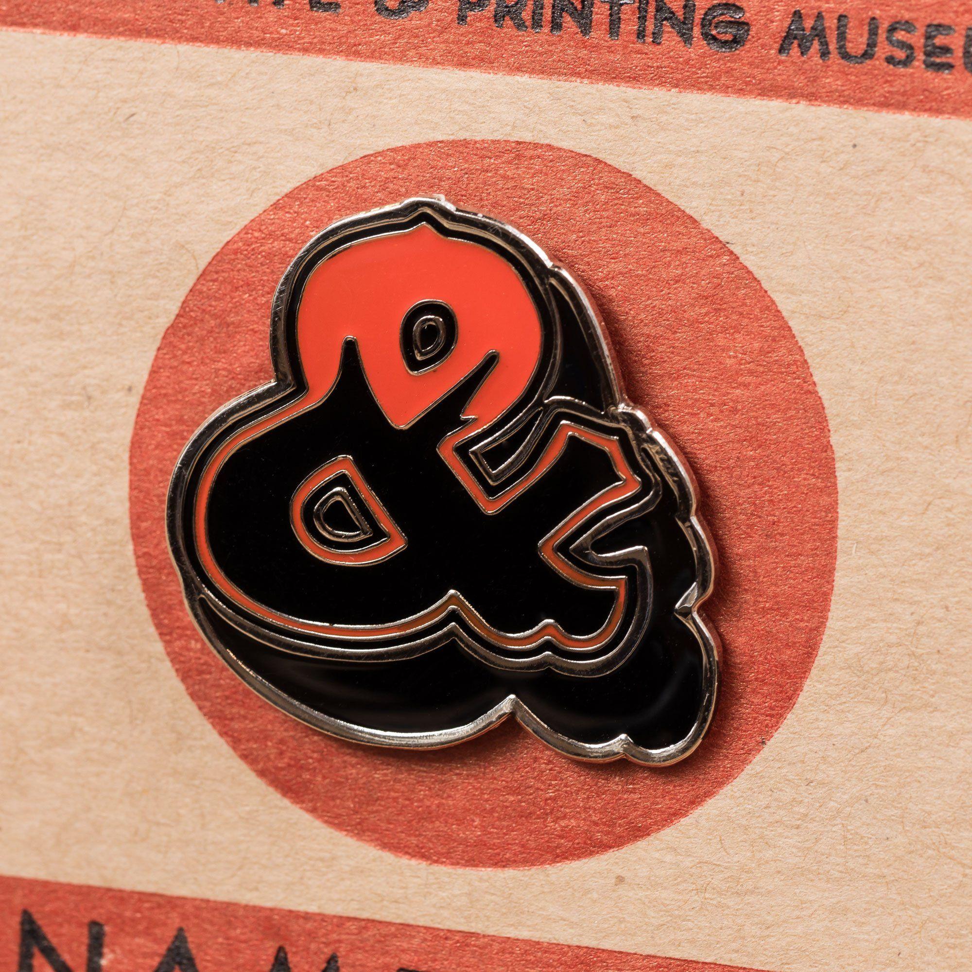 Red and Orange Ampersand Logo - Ampersand Lapel Pin