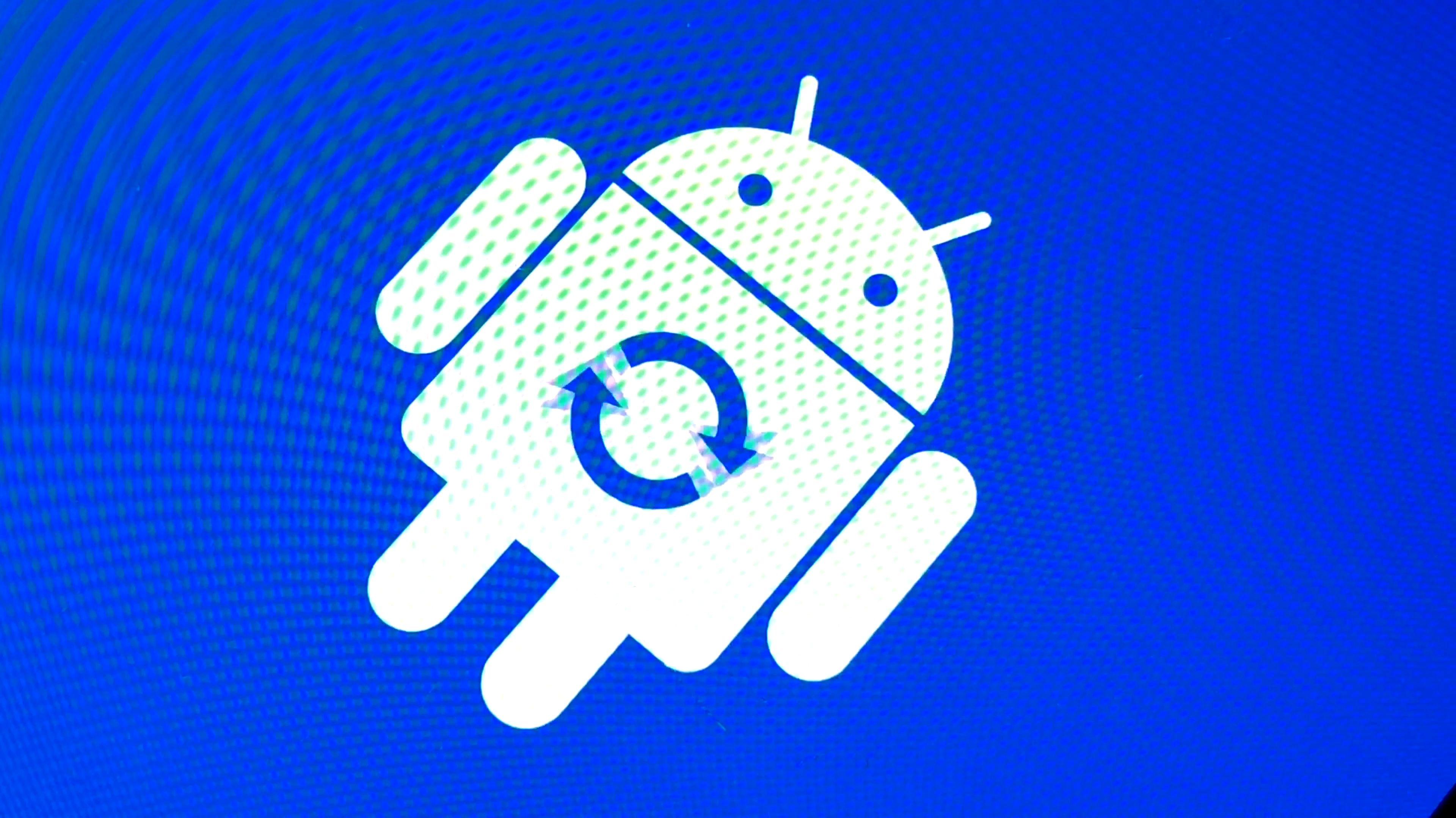 Android Robot Logo - Android robot logo icon on the smart phone screen during update