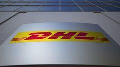 Modern Office Logo - Outdoor signage board with DHL Express logo. Modern office building ...