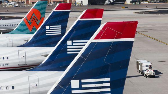 US Airways Blue Logo - US Airways promises 'quick' exit from Star Alliance