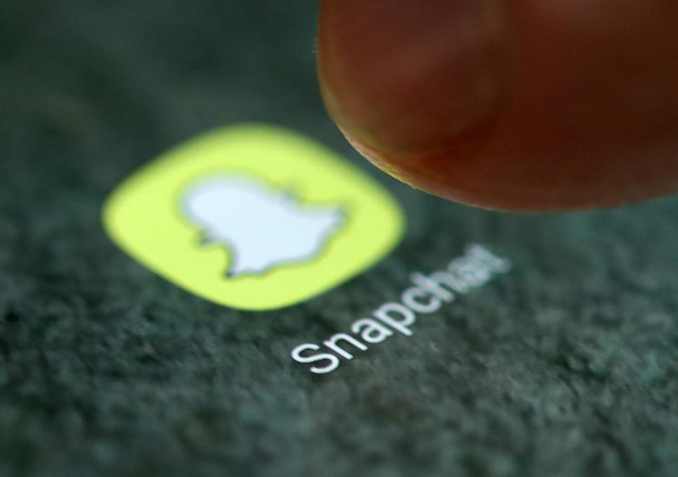 Snapchat App Logo - Snapchat adds 'creepy' ad targeting, letting companies track you