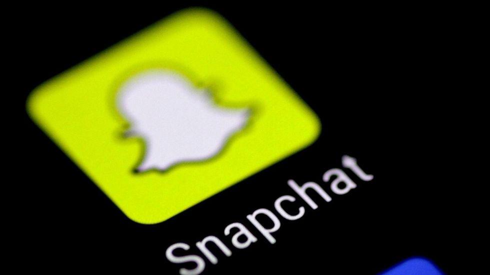 Snapchat App Logo - Snap shares rise 20pc after photo-messaging app says users will ...