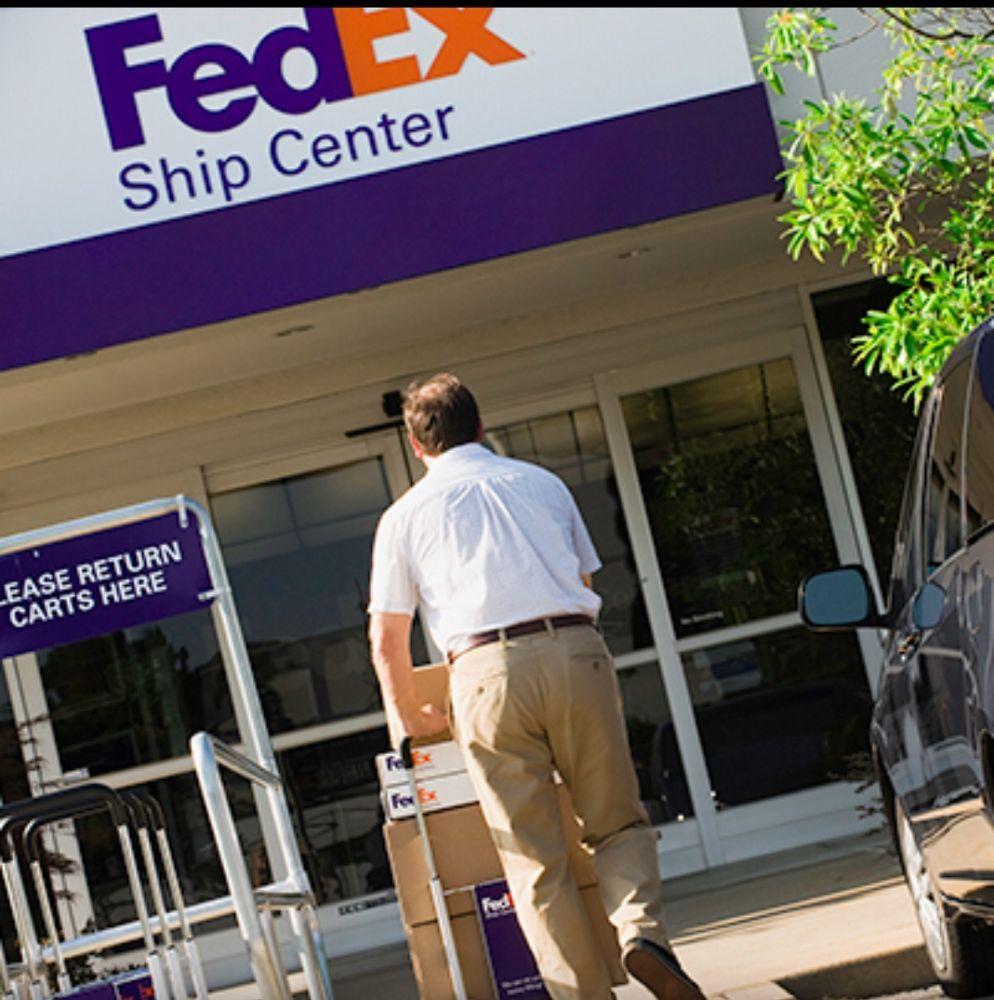 Moving Federal Express Logo - On the move... - Fedex Express Office Photo | Glassdoor.co.uk