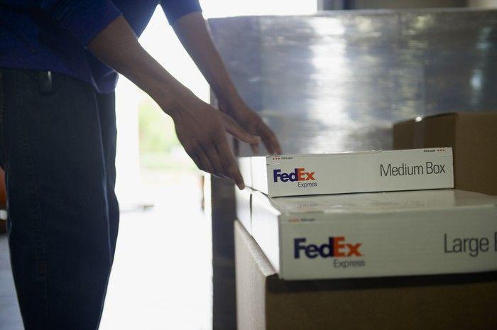 Moving Federal Express Logo - Why FedEx Stock Dropped Today -- The Motley Fool