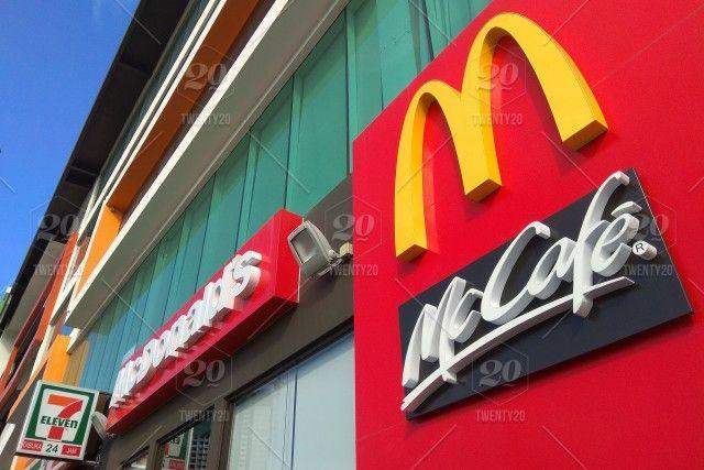 Resturants Red Hamburger Logo - Close up McDonald's logo sign. McDonald's is the world's largest ...